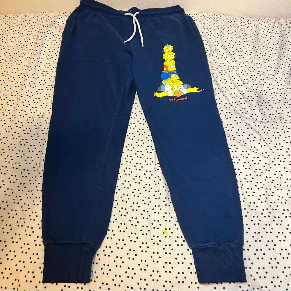 All dark blue The Simpson themed sweatpants.
